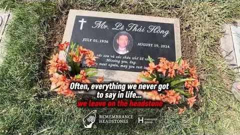 Flat granite grave marker with a ceramic photo