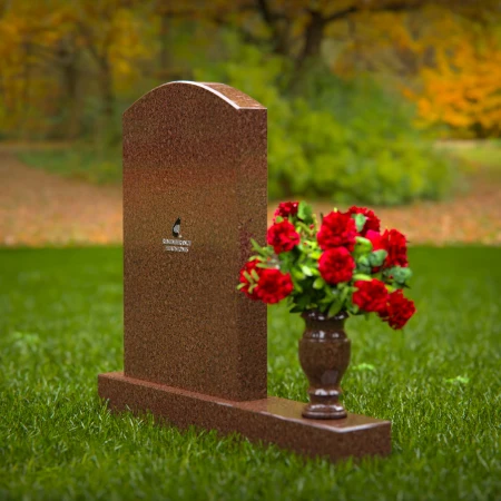 Beautiful upright headstones with flower vase details.