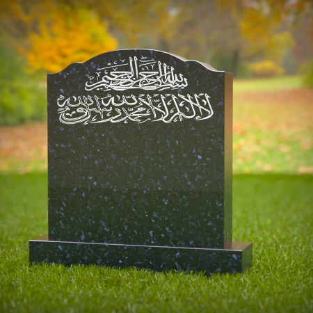 1411 - Islamic Headstone with Arabic Calligraphy in a Tranquil Cemetery