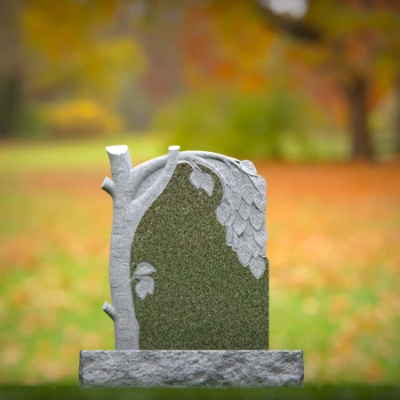 1556 - Tree-Inspired Granite Headstone with Carved Leaves