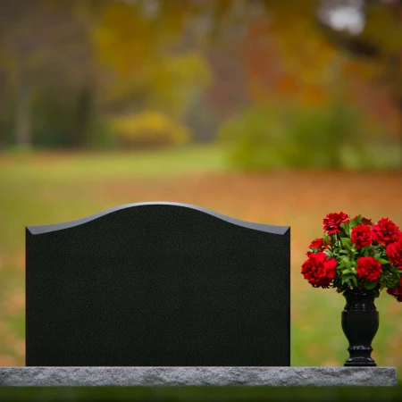 1261 - Classic Granite Headstone with Graceful Curved Top and Floral Vase – A Timeless Tribute