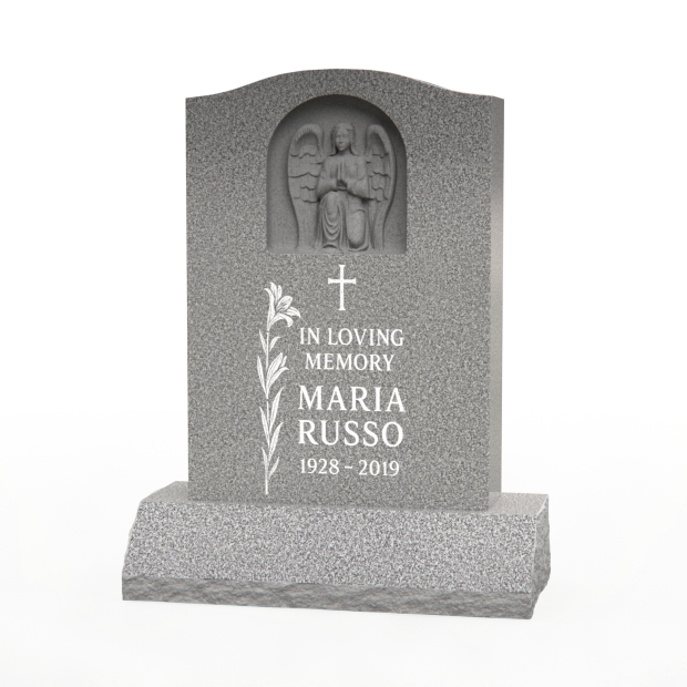 1205023 - Upright Monument With Carved Angel Relief in Serene Landscape