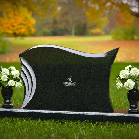 1339 - Elegant Curved Memorial Headstone with Artistic Detailing