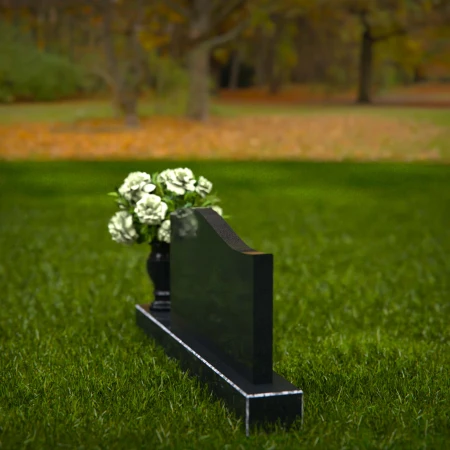 1258 - Modern Granite Headstone with Subtle Wave Design and Floral Vase – A Lasting Tribute - 2