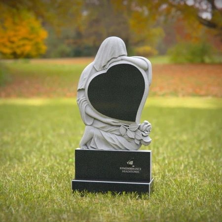 1242 - Heart-Shaped Granite Headstone with Angel Design – Memorial Tribute