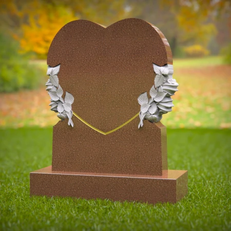 1415 - Heart-Shaped Memorial Headstone with Floral Engraving in a Peaceful Cemetery